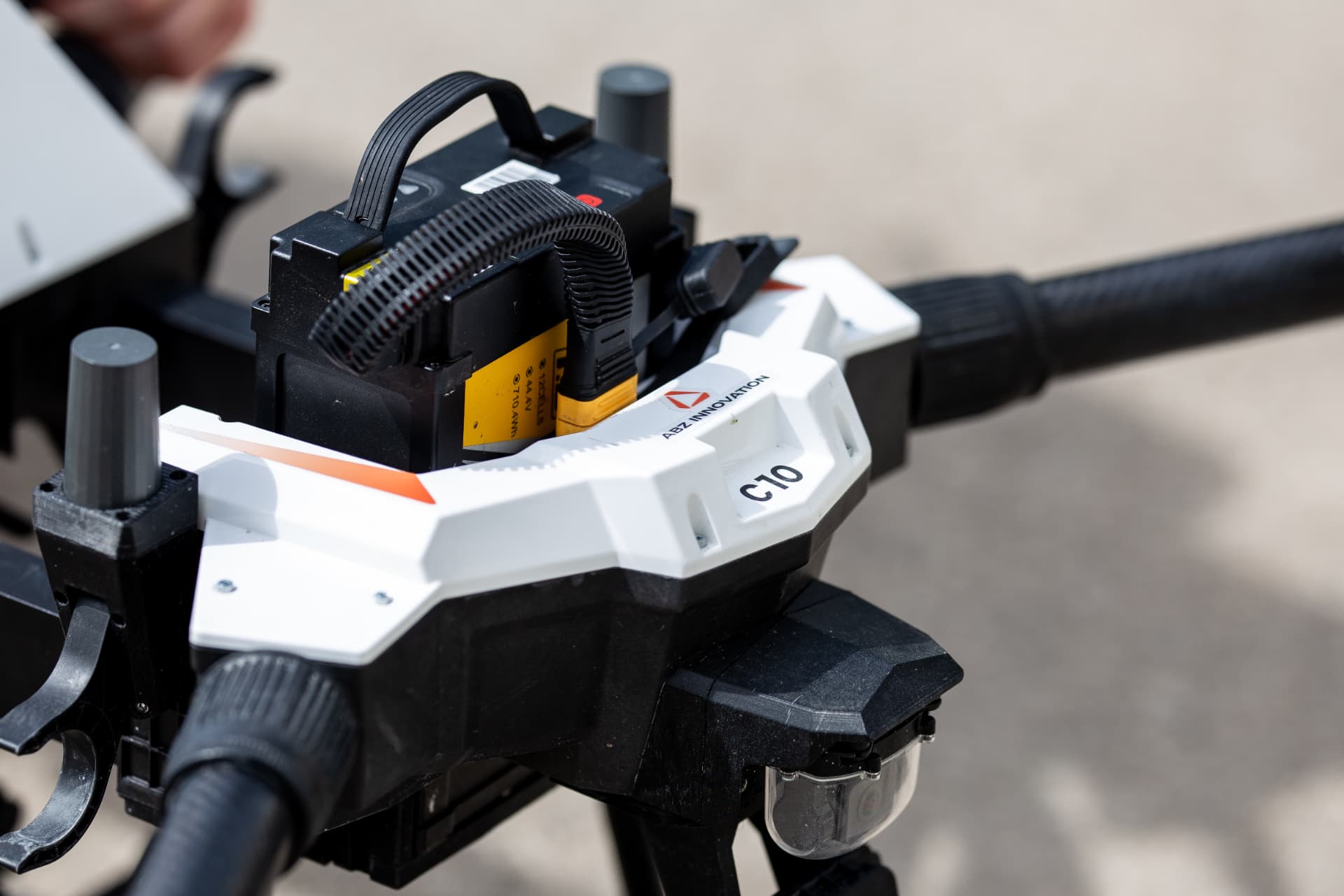Close detail of the C10 boom arm, motor and battery mounting